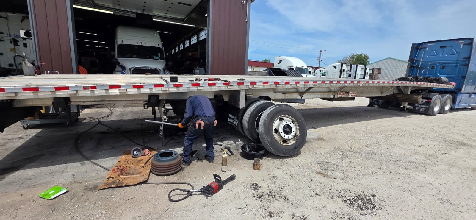 Fleet trailer units inside tracking systems workshop
